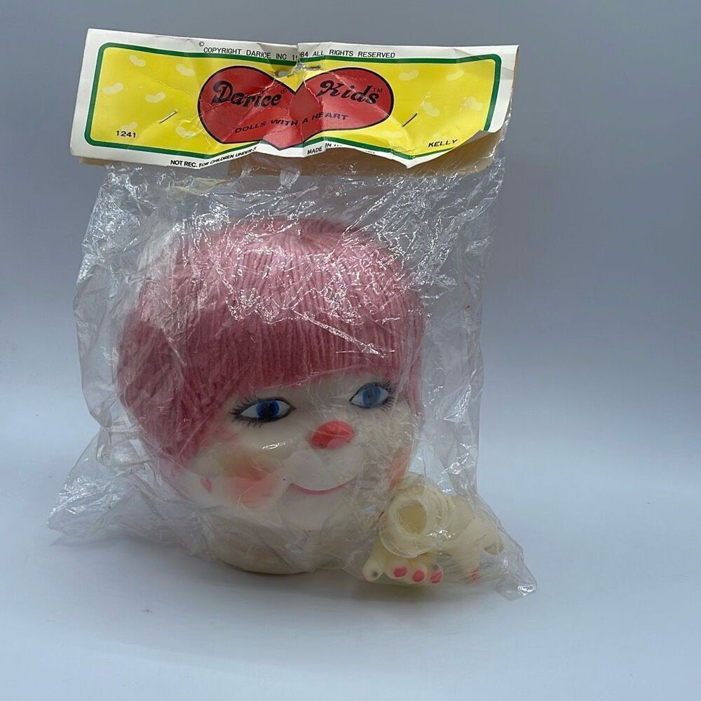 1984 Darice Kids crafts “Kelly” pink yarn hair head & hands.